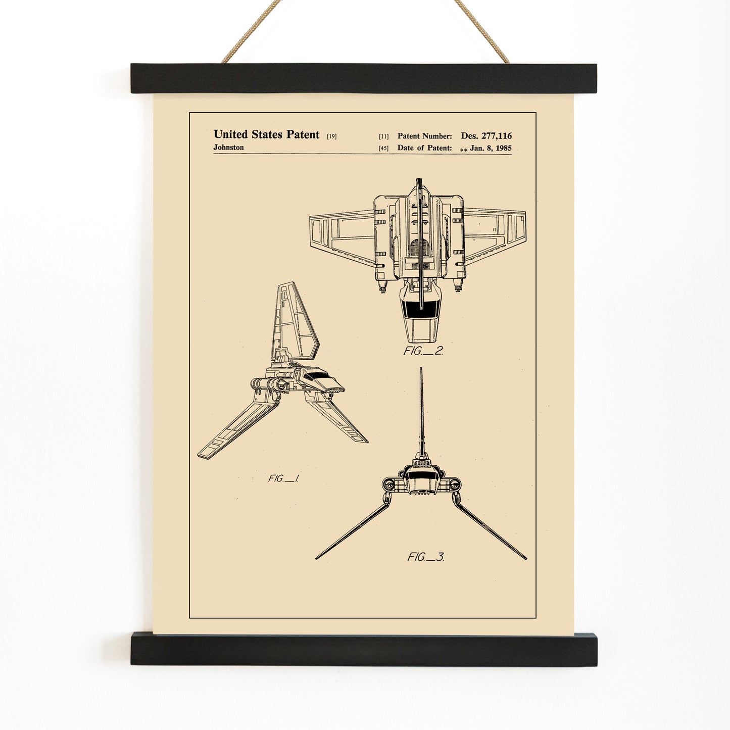 Technical drawings and vintage poster of Star Wars Imperial Shuttle patent artwork by Joe Johnston, with wooden magnetic frame on white background