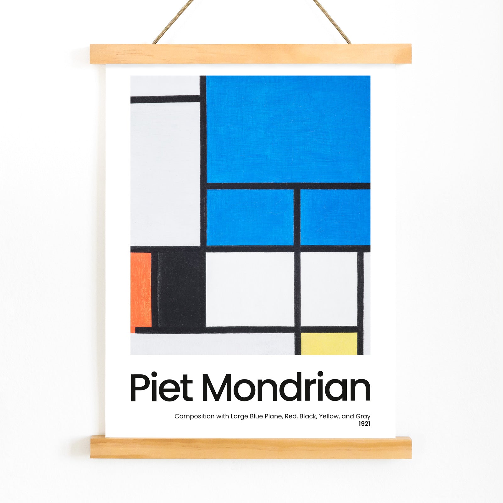 Abstract geometric painting and poster featuring Composition with Large Blue Plane Red Black Yellow and Gray by Piet Mondrian, with wooden magnetic frame on white background