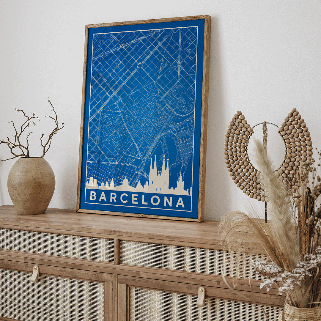 Minimalist blue and white map of Barcelona by Moryarty featuring iconic landmarks street layout and skyline poster titled Minimalist Map of Barcelona 2, framed and displayed in home decor