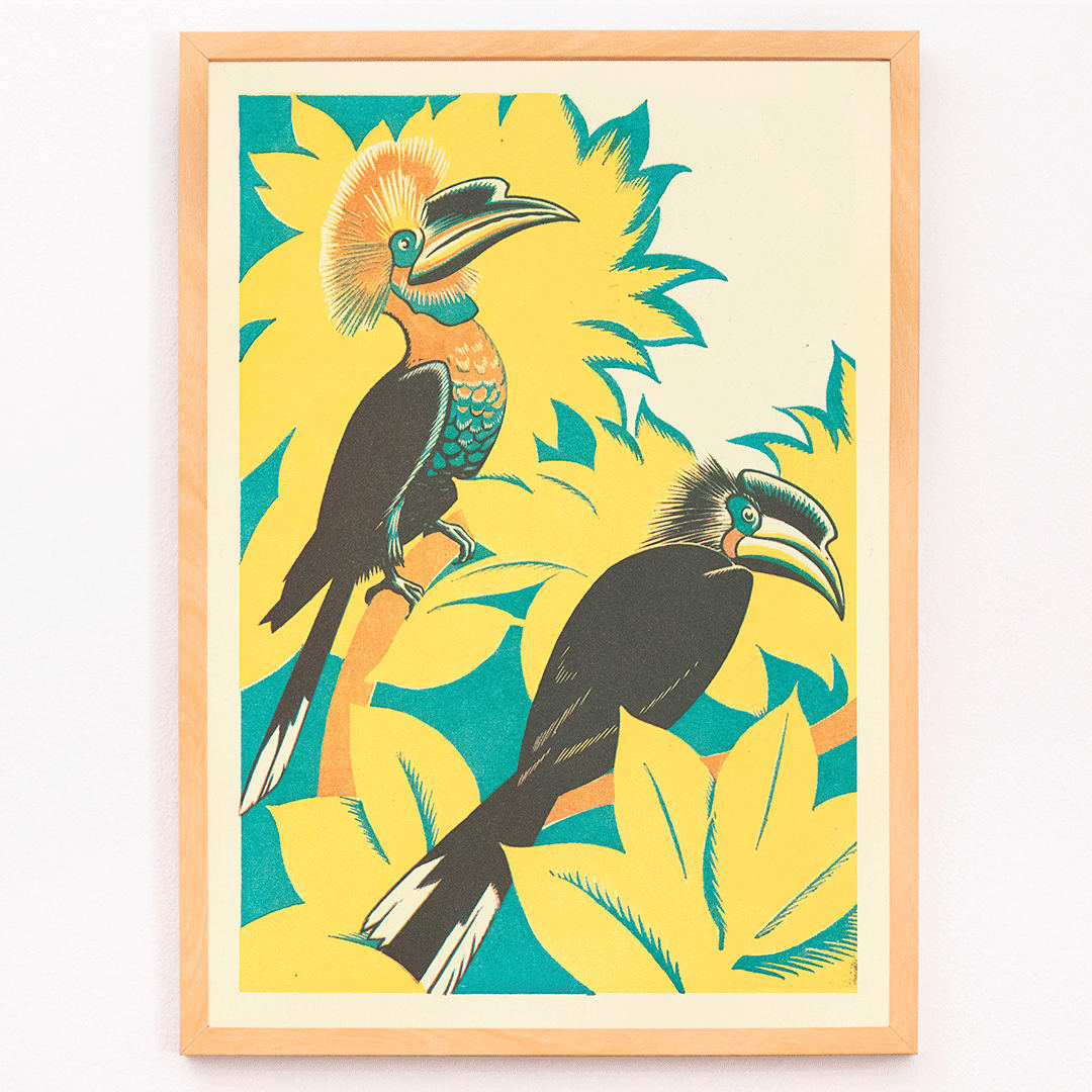 Colorful birds with vibrant plumage among yellow stylized foliage artwork by Clifford Webb from A Jungle Picnic Pl 07, framed and displayed in modern living room decor