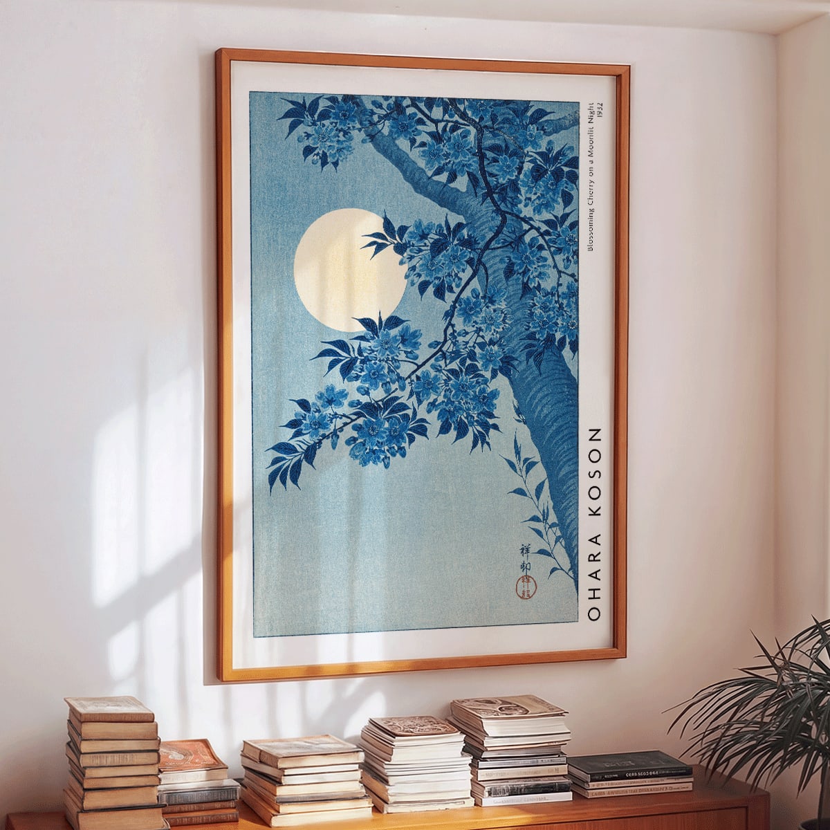 Cherry blossoms and full moon by Ohara Koson poster showing cherry tree in full bloom under moon Blossoming Cherry on a Moonlit Night, framed and displayed in modern living room decor