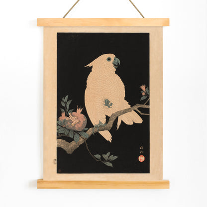 White cockatoo perched on a branch with pomegranate artwork by Ohara Koson poster, with wooden magnetic frame on white background