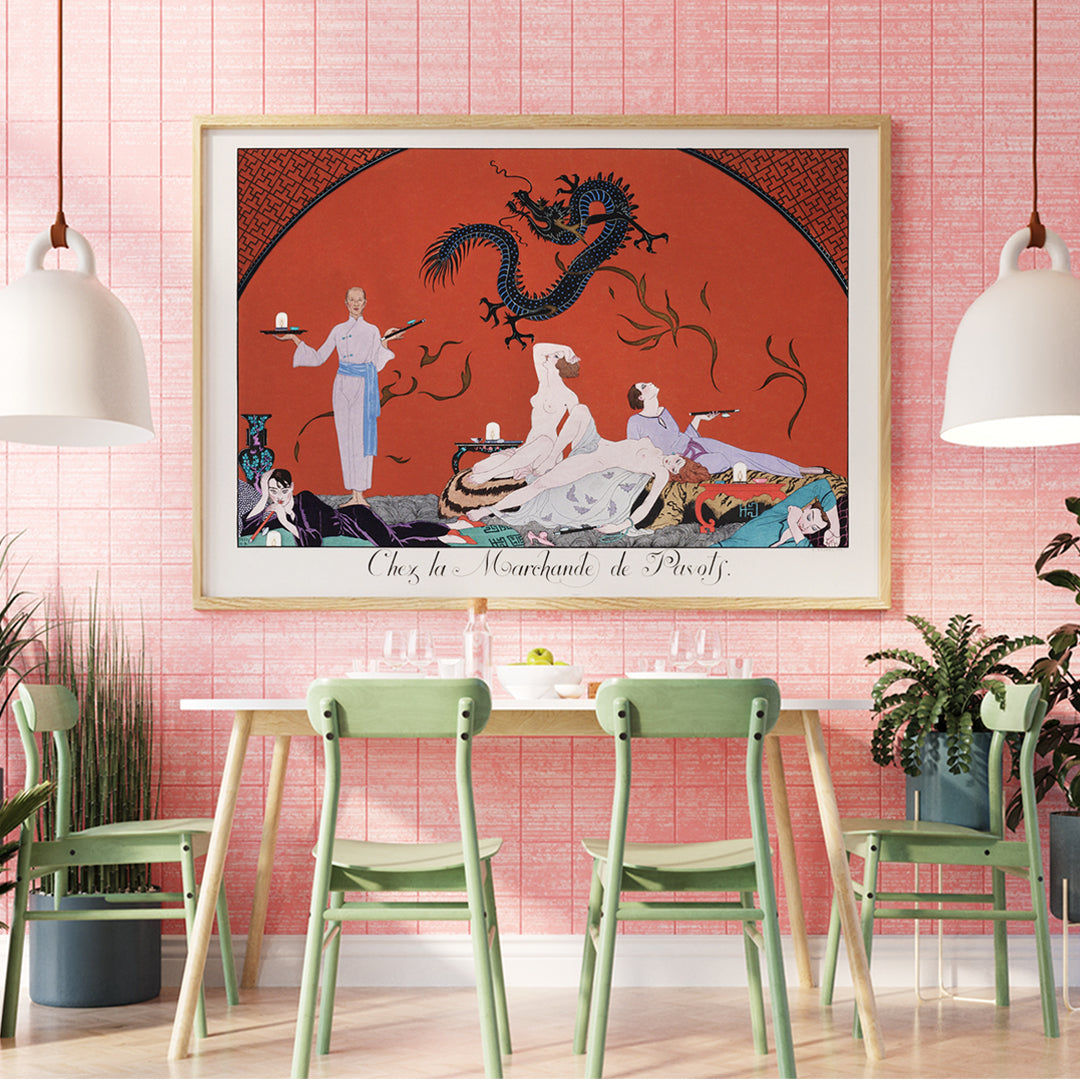 Opulent oriental scene with reclining figures and a blue dragon in Chez la Marchande de Pavots by George Barbier poster on a red background, framed and displayed in home decor