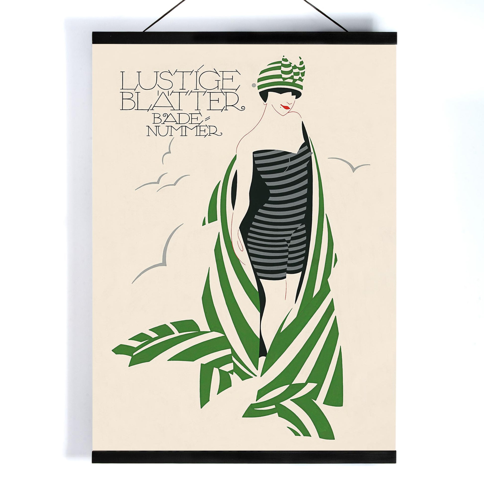 Julius Klinger Lustige Blatter Badenummer poster with stylized woman in striped swimsuit, green palm leaves, cream background, with wooden magnetic frame on white background