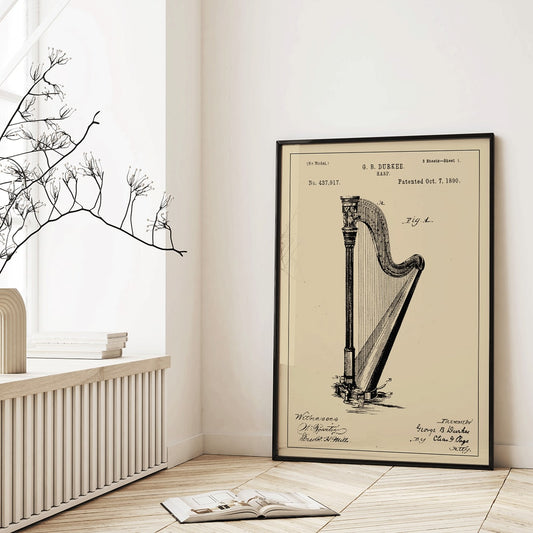 Harp patent drawing and poster by G B Durkee featuring detailed technical drawing and historical patent information, framed and displayed in home decor