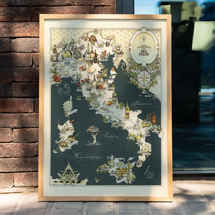 Vsevolod Nicouline Gastronomic Map of Italy poster with illustrated regional foods coastal boats and vintage blue beige details, framed and displayed in home decor