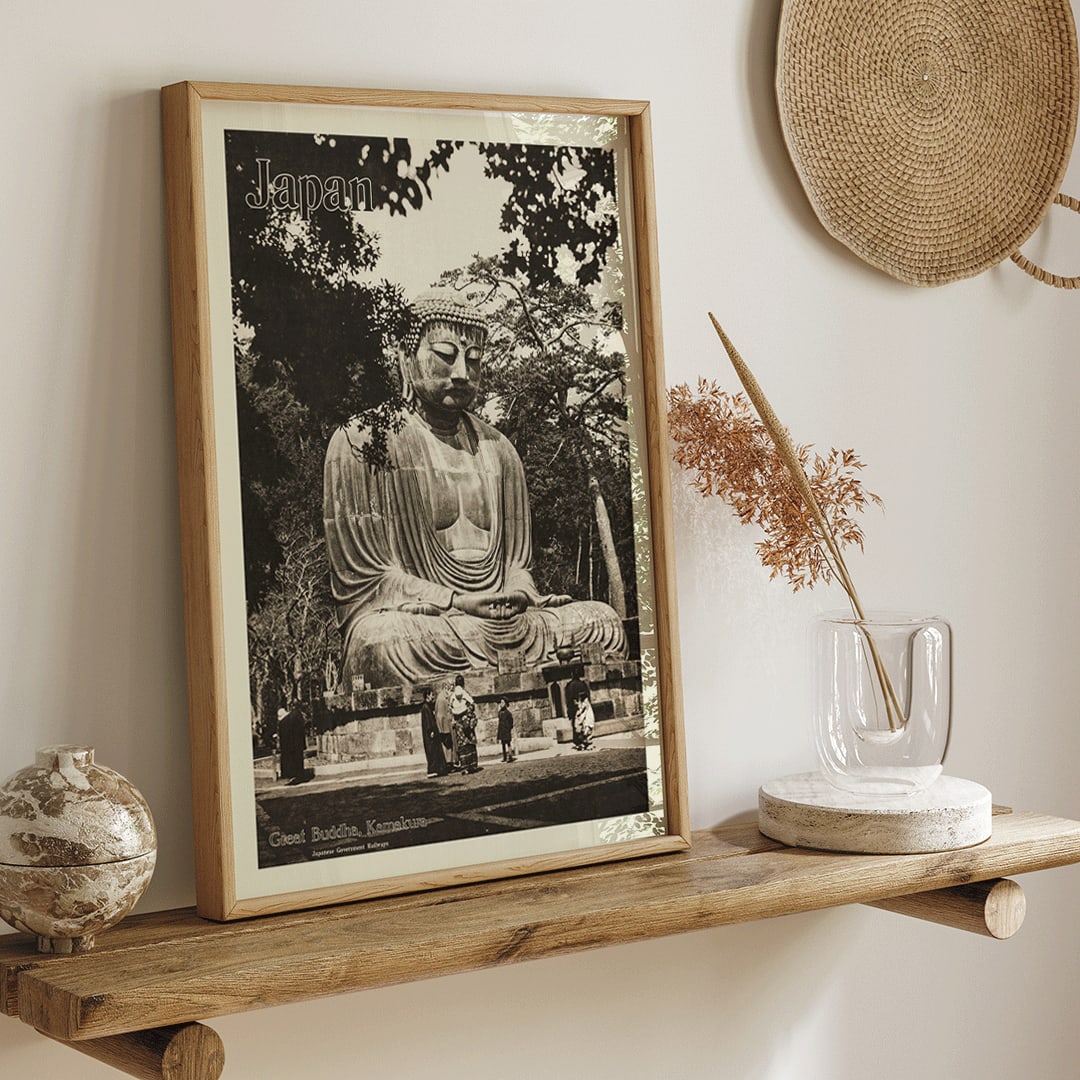 Japan travel poster by Japanese Government Railways showing the Great Buddha in Kamakura with people near the large statue, framed and displayed in home decor