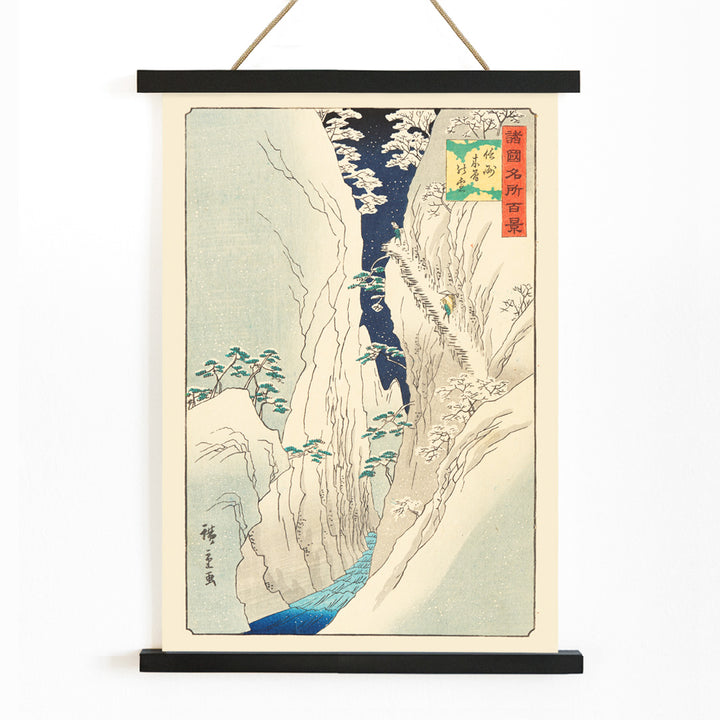 Snowy mountain gorge with river travelers and trees in The Kiso Gorge in Snow Shinano Province by Hiroshige II Japanese artwork poster, with wooden magnetic frame on white background