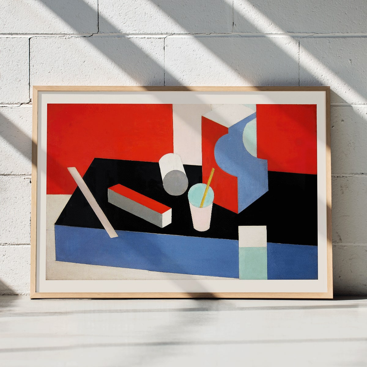 Colorful geometric abstract painting titled Kubik in red black and blue by artist Patrick Henry Bruce poster, framed and displayed in home decor