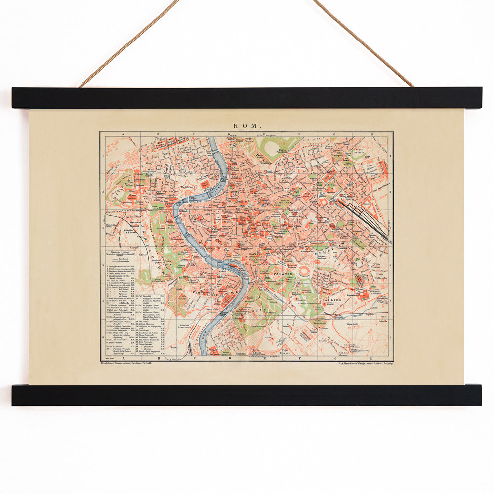 Ancient map of Rome by Bibliographic institute of Liepzig showing detailed city layout river neighborhoods and landmarks, with wooden magnetic frame on white background