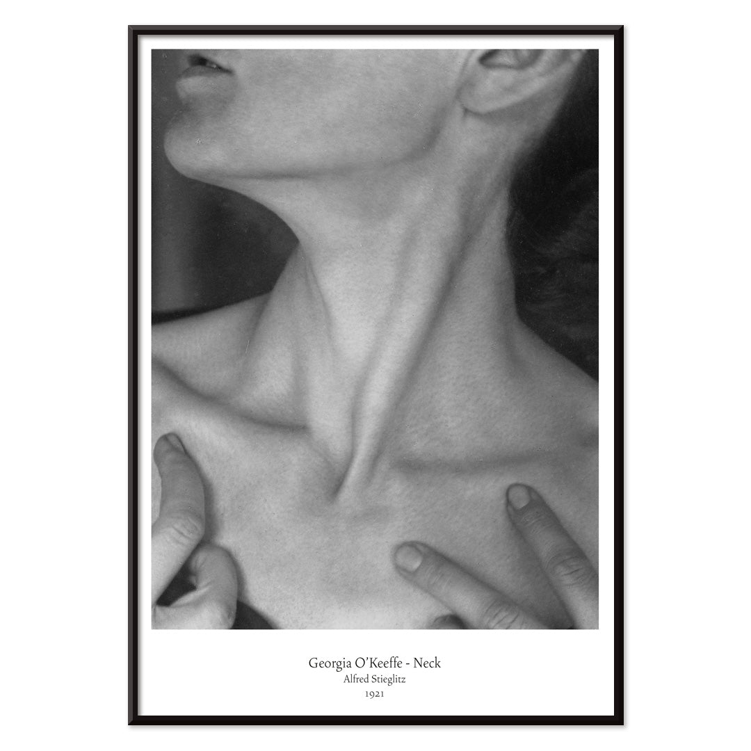 Black and white portrait of Georgia O Keeffe neck and hands by Alfred Stieglitz wall art poster photography decor, with black aluminium frame on white background
