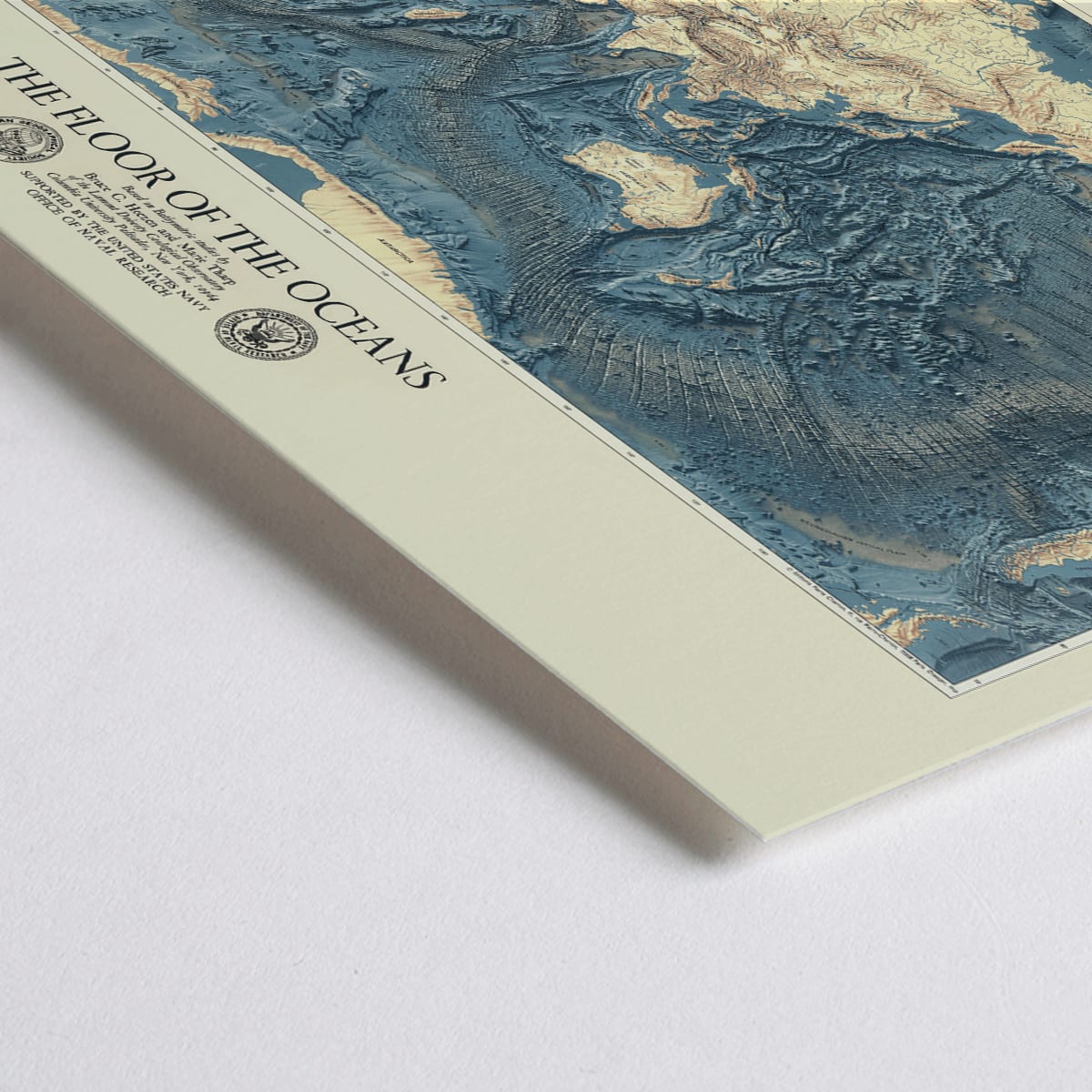 Closeup detail of World map artwork showing ocean floors titled The Floor of the Oceans bathymetric map poster