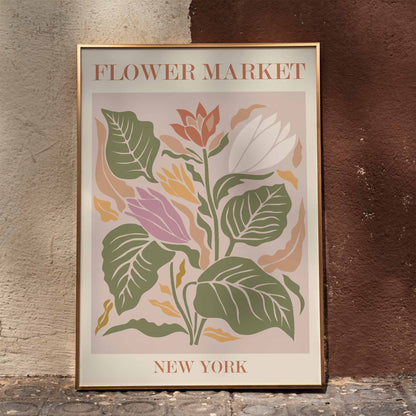 Colorful botanical illustration poster of multicolored flowers and leaves titled Flower Market New York by Moryarty, framed and displayed in home decor