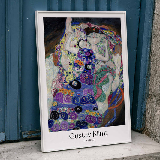 Colorful abstract poster of The Virgin by Gustav Klimt featuring intertwined women in vibrant patterned fabrics and floral designs, framed and displayed in home decor