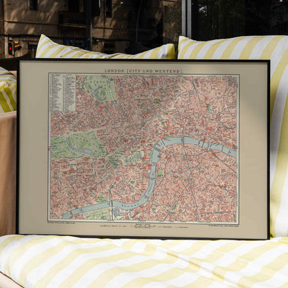 Ancient map of London by Bibliographic institute of Liepzig showing detailed vintage city streets river Thames and parks, framed and displayed in home decor