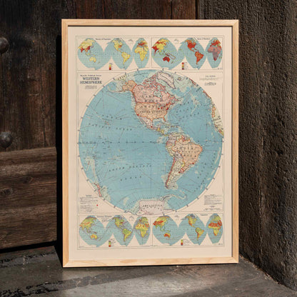 Western Hemisphere map by Rand McNally and Co showing detailed continents oceans and political geographic features, framed and displayed in home decor