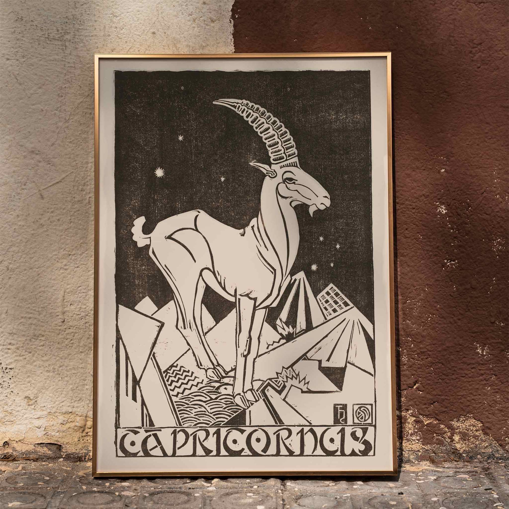 Capricorn zodiac sign illustration and poster featuring a stylized goat under stars in an abstract landscape artwork titled Capricornus by Henri van der Stok, framed and displayed in home decor