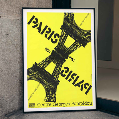 Roman Cieślewicz Paris-Paris 1937-1957 poster with yellow background black Eiffel Tower and mirrored typography, framed and displayed in modern living room decor